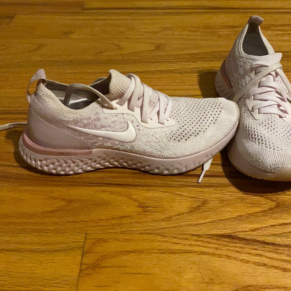 Pink Nike running tennis shoes